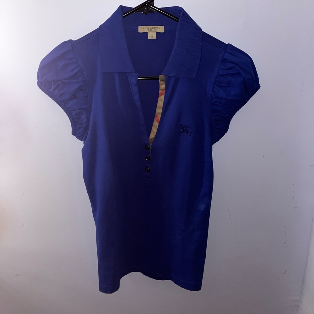 Burberry polo shirt.